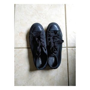 All black Converse sneakers